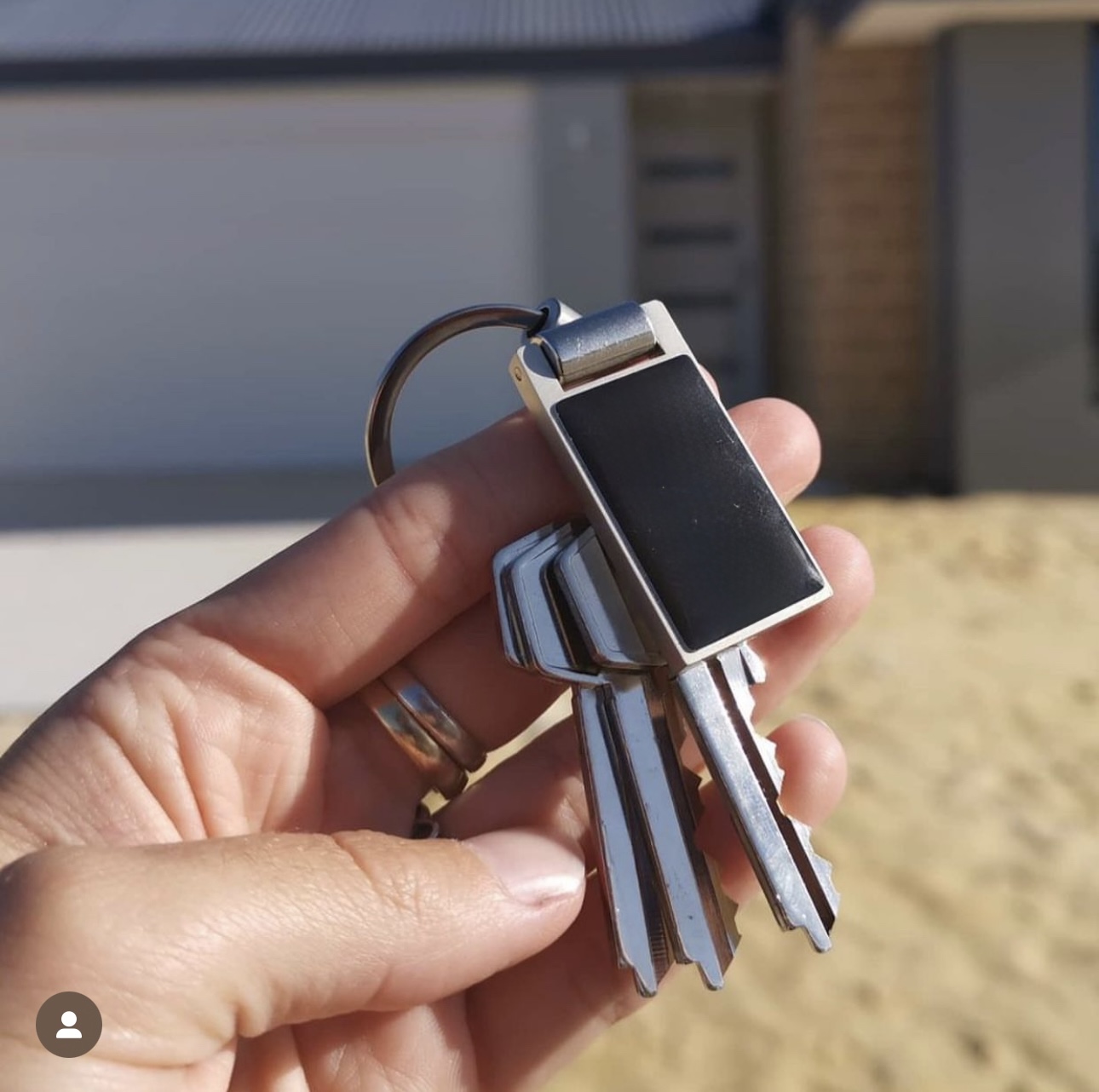 Keys being handed over to new homeowners