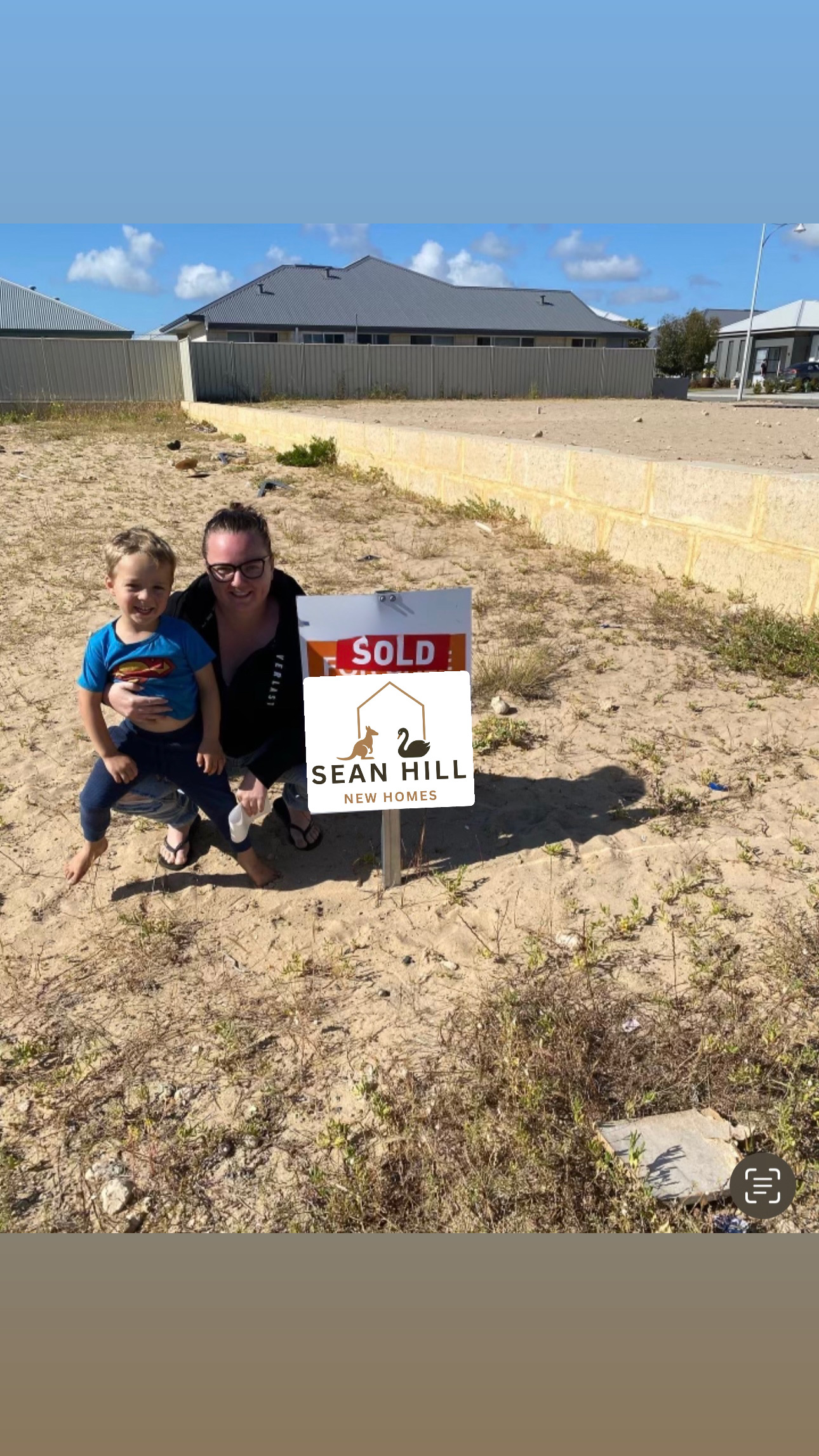 Mother and child with sold sign on their land